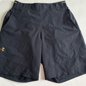 Under Armour gold and black fitted heat gear shorts size medium